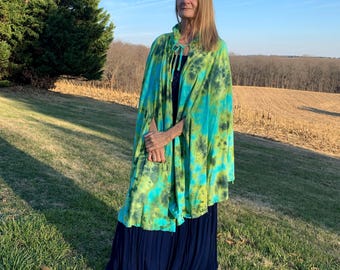 Soft bamboo and cotton ice-dyed cape with hood in greens and light blue