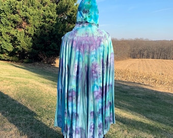 Soft bamboo and cotton ice-dyed cape with hood in greens and purples