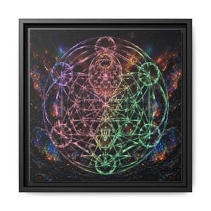 May include: A square framed wall art piece featuring a glowing, multi-colored geometric pattern of intersecting circles and lines. The design displays a gradient of pink, purple, and green hues set against a dark, textured, cosmic-like background.