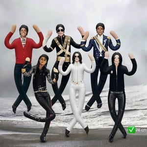 May include: Six posable action figures of Michael Jackson, each 28 cm tall, featuring iconic outfits including a red cardigan, black military-style jacket, blue sequined blazer, black leather ensemble, white textured suit, and black jacket with pants.