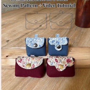 May include: LUMINEA Earbud Pouch Sewing Pattern + Video Tutorial. Four small fabric pouches with snap closures. Two are solid blue with blue floral flaps, and two are solid maroon with multi-colored floral flaps. Includes two line art diagrams.
