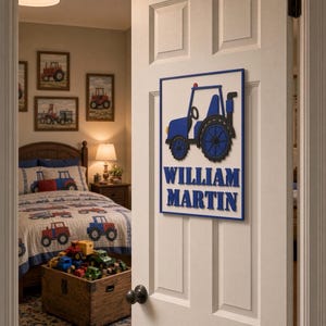 May include: A rectangular white wall sign with a blue border featuring a blue tractor graphic and the name WILLIAM MARTIN in blue block letters. The sign is mounted on a white interior door with a black knob and a classic panel design.