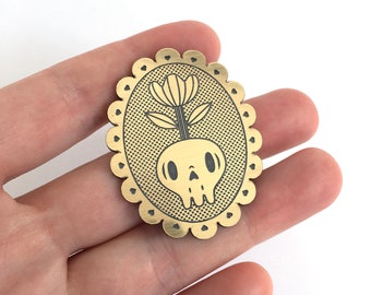 Memento mori brooch with skull and flower, in lasercut brushed gold acrylic