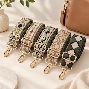 May include: Five adjustable bag straps featuring woven geometric patterns in shades of olive green, beige, and terracotta. Each strap includes gold-toned metal hardware, including sliding buckles and swivel lobster clasps for secure attachment to bags.