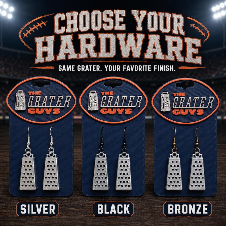 May include: Three pairs of silver-toned cheese grater earrings displayed on dark blue cards labeled The Grater Guys. The earrings feature silver, black, and bronze-colored hooks respectively. The text reads Choose Your Hardware, Same Grater. Your Favorite Finish.
