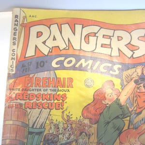 May include: A vintage Rangers Comics No. 57 issue from February with a yellow cover featuring the title text, a red banner, and an illustration of a red-haired character and a masked figure holding a pistol, with the text Firehair White Daughter of the Sioux in Redskins to the Rescue.