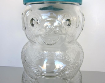 SKIPPY PEANUT BUTTER  Vintage Figural Glass Promo. Jar** Skippy Teddy Bear  **Teal Plastic Cut Lid** 48 oz. Jar.   1990's** Great Condition
