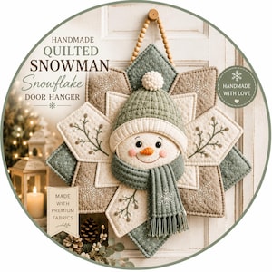 May include: A handmade quilted snowman snowflake door hanger featuring a central snowman with a green knit hat, a matching green scarf, and an orange nose. The background is a star-shaped quilted fabric in shades of beige and green with snowflake embroidery.