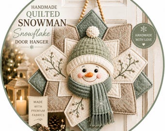 May include: A handmade quilted snowman snowflake door hanger featuring a central snowman with a green knit hat, a matching green scarf, and an orange nose. The background is a star-shaped quilted fabric in shades of beige and green with snowflake embroidery.