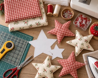 May include: A sewing project featuring fabric stars in red gingham and cream with holly prints, alongside paper star templates, a rotary cutter, scissors, sewing machine, thread spools, pins, clips, batting, and an iron on a wooden surface.