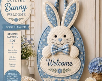 May include: A quilted bunny door hanger featuring blue and white floral fabric, a cream-colored face, a blue gingham bow tie, and a heart-shaped nose. The oval base displays the word Welcome in blue script above a small floral embroidery detail.