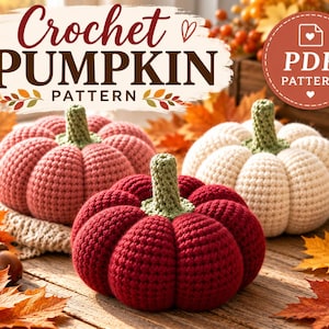 May include: Three crocheted pumpkins in dark red, light pink, and cream, each with a green stem. The text "Crochet PUMPKIN PATTERN" and a circular "PDF PATTERN" badge are visible at the top. The pumpkins are arranged on a wooden surface.