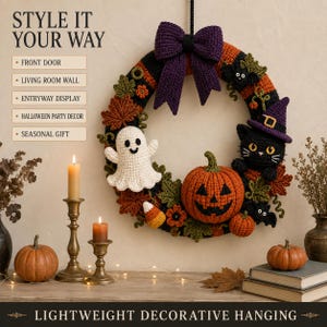 Finished Halloween Crochet Wreath displayed as seasonal home decor with candles and autumn styling. Crochet ghost, pumpkin, cat and witch details create a lightweight decorative hanging for doors, walls and Halloween displays.