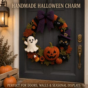 Finished Crochet Halloween Wreath hanging on a dark door with ghost, jack-o-lantern, black cat, witch hat, fall leaves and purple bow. Cozy spooky handmade decor for doors, walls and seasonal Halloween displays