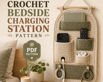 May include: A beige and olive green crochet wall organizer with multiple pockets for devices and cables, featuring a wooden dowel and hanging cord. The text reads CROCHET BEDSIDE CHARGING STATION PATTERN and PDF PATTERN. It is designed for storage.