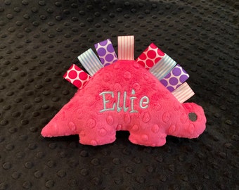 pink dinosaur figures