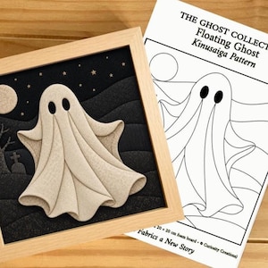 May include: A framed Kinusaiga fabric art piece featuring a beige ghost against a black night sky with a moon, stars, and a tombstone, accompanied by a printed pattern sheet titled THE GHOST COLLECTION Floating Ghost Kinusaiga Pattern.