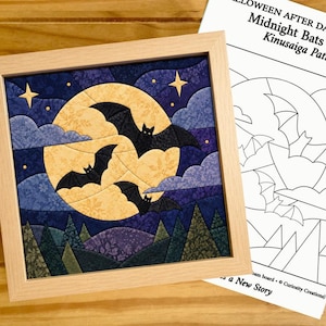 May include: A framed Kinusaiga art piece featuring a yellow full moon, dark purple clouds, and three black bats, accompanied by a white paper pattern sheet titled HALLOWEEN AFTER DARK COLLECTION Midnight Bats Pattern Kinusaiga Pattern.