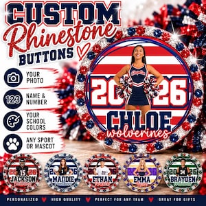 May include: Custom rhinestone buttons featuring a circular design with a central photo of a cheerleader, the year 2026, the name Chloe, and the text Wolverines. The border is encrusted with red, white, and blue rhinestones.