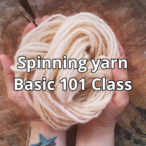 May include: A close-up of a hand holding a ball of white yarn. The text "Spinning yarn Basic 101 Class" is superimposed on the image.