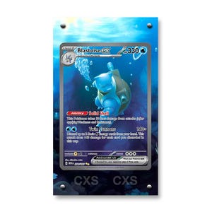May include: A Blastoise ex trading card featuring a blue water-type creature with cannons on its back, set against a deep blue underwater background with bubbles. The card displays 330 HP, the Solid Shell ability, and the Twin Cannons attack text.