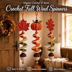 May include: Three hanging crochet wind spinners featuring autumn motifs. The left has a maple leaf, the center a pumpkin, and the right an oak leaf. Each has a spiral tail in orange, green, and cream, ending with a crocheted acorn and a small bell.
