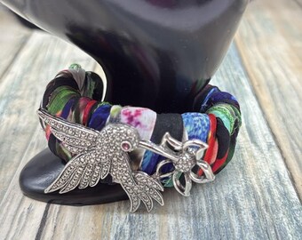 Adorned Crown Jewelry assemblage Hummingbird Multicolor Fabric cuff bracelet