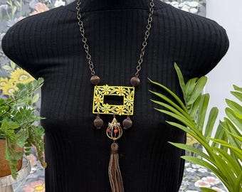 Adorned Crown Jewelry assemblage yellow frame flower necklace