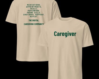 Puede incluir: Una camiseta beige de manga corta con texto en verde oscuro. El frente muestra la palabra Caregiver. La parte posterior enumera: MEDICATIONS. APPOINTMENTS. MEALS. PAPERWORK. PHONE CALLS. EMOTIONAL SUPPORT. REPEAT. THE DIGITAL CAREGIVING COMMUNITY.