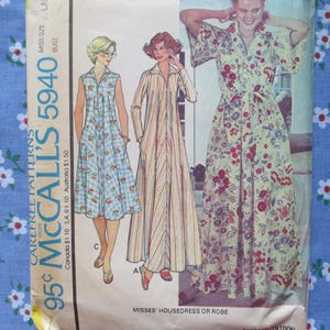 May include: Vintage McCall's 5940 sewing pattern for misses' housedresses or robes. The pattern features illustrations of three different dress styles, including a floral print robe and a striped dress. The pattern's text includes the price and sizing information.