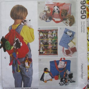 May include: A child wearing a red backpack filled with stuffed animals, including a black bear, a zebra, and a cat. The image also shows a variety of other stuffed animals and bags, including a red and white checkered tote bag and a blue tote bag.