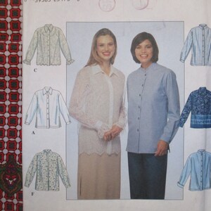 May include: A sewing pattern for six different blouses. The pattern includes a white blouse with a collar, a blue blouse with a mandarin collar, a white blouse with a lace trim, a blue and white striped blouse, a blue floral blouse, and a light blue blouse with a collar.
