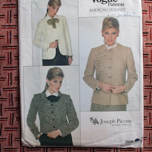 May include: Vogue Patterns American Designer sewing pattern featuring three jacket designs. The jackets are shown in cream, tan, and black and white tweed. The pattern includes the designer's name, Joseph Picone, and the pattern number 2828.