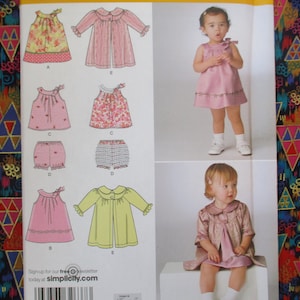 2000s sewing pattern Simplicity 2668 baby and  toddlers dress top panties and coat UNCUT sizes XXS-XS-S-M-L