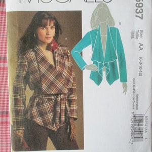 May include: A sewing pattern for a wrap jacket with a plaid design. The pattern includes instructions for sizes 6-8-10-12. The pattern number is M5937/AA 1.