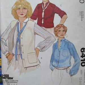 May include: A sewing pattern for a shirt and vest. The pattern includes three sizes: 12, 14, and 16. The pattern is for a combination of a shirt and vest. The pattern is available in the following combinations: 12-14-16.