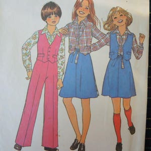 vintage 1970s simplicity sewing pattern 7909 girls shirt pants reversible vest and back wrap skirt size 7 and 8