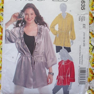May include: A sewing pattern for a jacket with a drawstring waist. The pattern is for sizes 14-16-18-20. The pattern is shown on a model wearing a gray jacket with a black top underneath. The pattern also includes a yellow jacket and a red jacket.