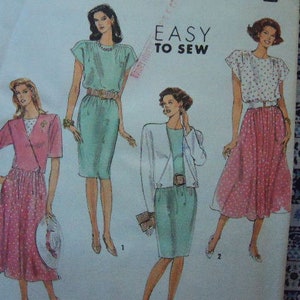 May include: A sewing pattern featuring four different women's clothing designs. The designs include a green dress, a pink skirt and jacket, a green skirt and white jacket, and a pink skirt and white top. The text "Easy to Sew" is printed on the page.