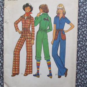 May include: Vintage sewing pattern featuring three jumpsuit designs. The jumpsuits are illustrated in various colors and patterns, including plaid, solid green with a motorcycle graphic, and blue with patterned pockets. The pattern is labeled "Size 12/14".