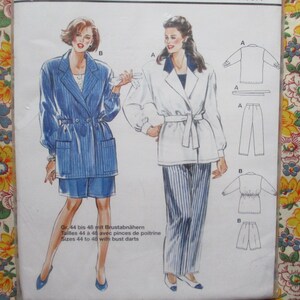 May include: A sewing pattern for a jacket and pants. The pattern includes instructions for sizes 44 to 48 with bust darts. The jacket is a white wrap style with a belt. The pants are a striped pattern in white and blue.