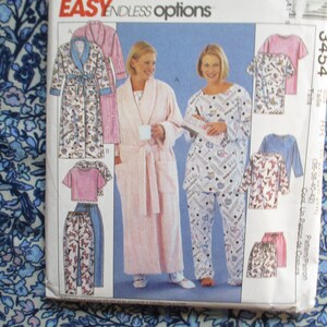 May include: A sewing pattern package featuring illustrations of sleepwear and robes. The package includes images of a pink robe, pajamas, a short-sleeved top, and pants. The text "EASY ENDLESS options" is visible at the top of the package.