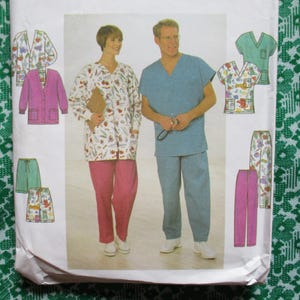 May include: A pattern for medical scrubs. The image shows a woman in a white patterned scrub top and pink pants, and a man in a blue scrub top and pants. Additional scrub top and pants designs are also shown.