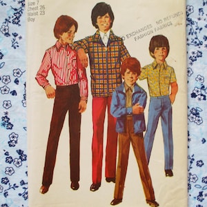 May include: Four boys wearing different patterned shirts and pants. The boys are standing in a row. The image includes the text "No Exchanges No Refunds Fashion Fabrics".
