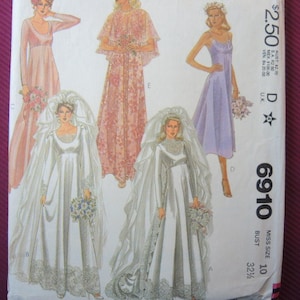 May include: A vintage sewing pattern for a bridal gown with a long, flowing skirt and a fitted bodice. The pattern includes four different styles, including a long-sleeved gown with a lace trim, a sleeveless gown with a scoop neckline, a gown with a cape, and a gown with a halter neckline. The pattern is for size 10 and has a bust measurement of 32 1/2 inches.