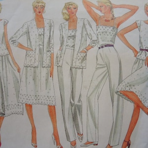 May include: Four women's fashion illustration patterns for a white top and skirt or pants outfit. The patterns include a sleeveless top with a lace trim, a cardigan, and a pair of pants. The text "JUES BASIC DESIGN" is visible in the image.