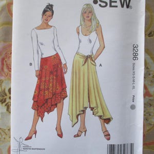 May include: Sewing pattern for two skirts, one with a red and gold print and the other a solid yellow. The pattern is for sizes XS-S-M-L-XL. The pattern is called "Sew" and the pattern number is 3286.