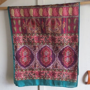 Vintage 1990s scarf paisley globally inspired polyester  partially sheer red burgundy green 11 x 53 inches