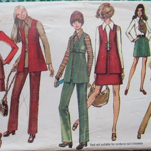May include: Vintage sewing pattern featuring illustrations of women's outfits from the 1970s. The designs include vests, skirts, and pantsuits in various colors like red, green, and tan. The pattern is for a size 12, with bust 34 inches and waist 25.5 inches.