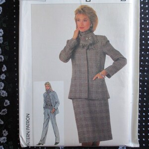 May include: A sewing pattern for a plaid skirt suit. The pattern includes a jacket and a skirt. The model is wearing a brown and white plaid skirt suit with a white blouse.